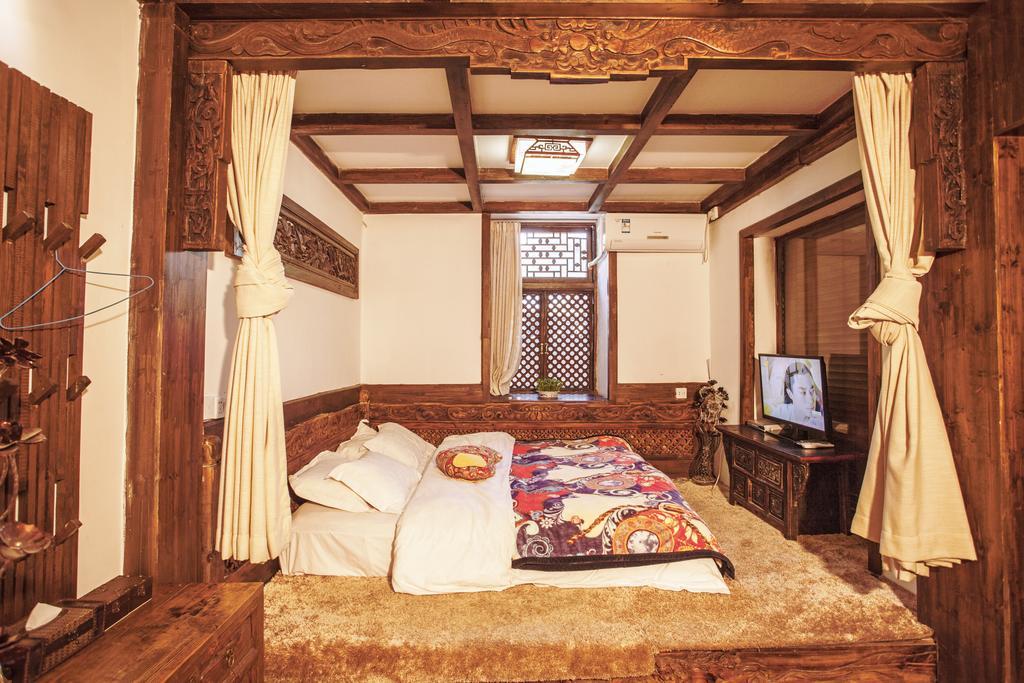 XI Tang Exquisite Hotel Lijiang  Camera foto