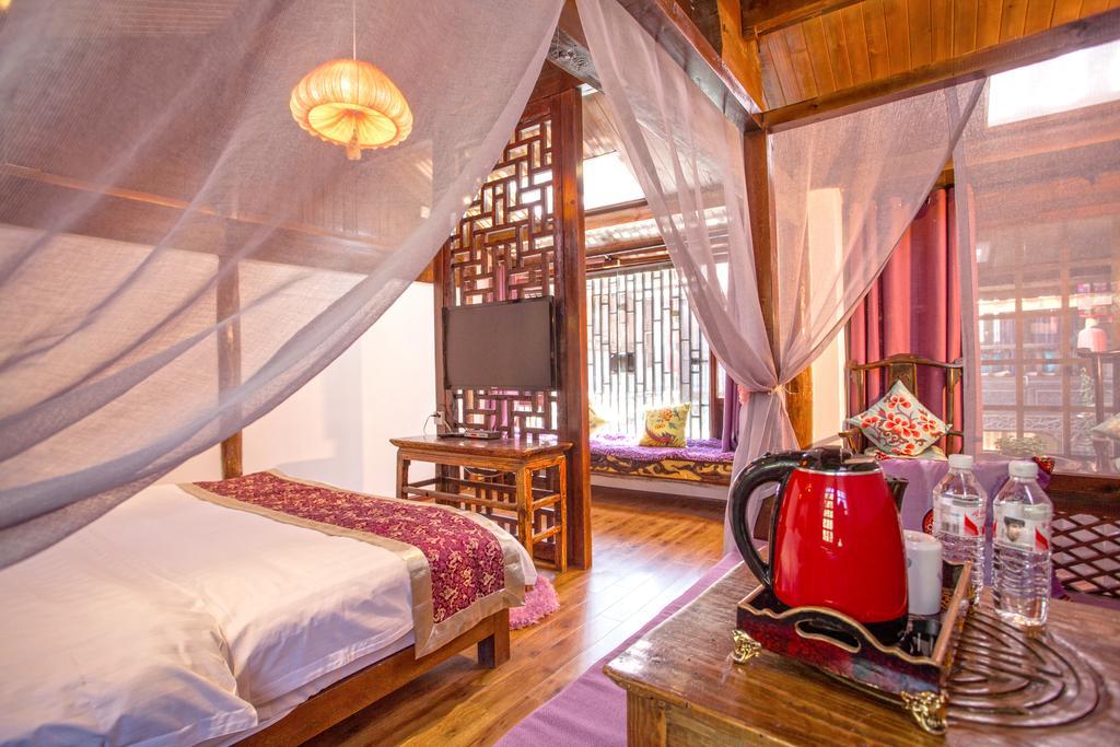 XI Tang Exquisite Hotel Lijiang  Camera foto