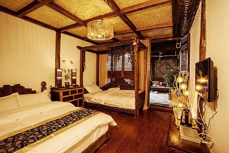 XI Tang Exquisite Hotel Lijiang  Camera foto